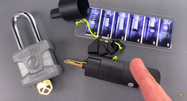 Watch the video Lock Picking Lawyer makes a key in five minutes